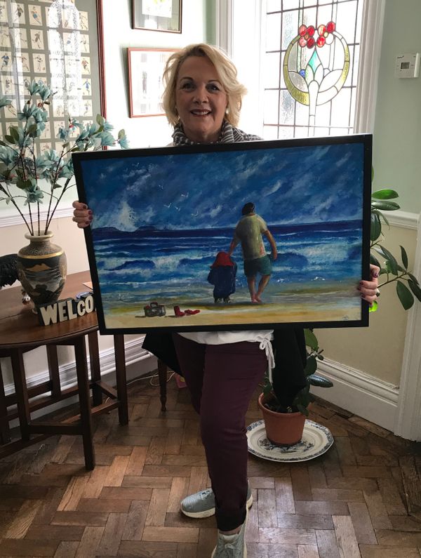 Penelope Garland accepts her new painting Paddington, acrylic on 20x30'' canvas..