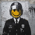 Street Art - Police Officer - Smiley Face - Urban Satire - Modern Graffiti - Riot Police - Yellow Smile - Pop Culture Art - Law Enforcement - Iconic Smiley - Stencil Style - Wall Decor