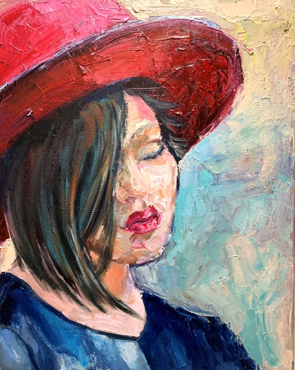 Woman in red hat.