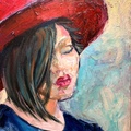 Woman in red hat.